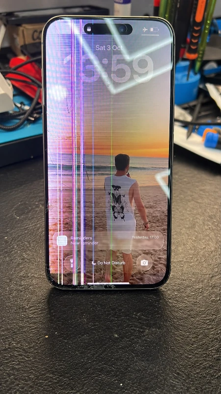 Cracked iPhone screen before repair